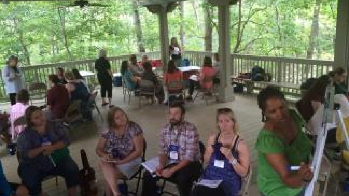 people outdoors at conference