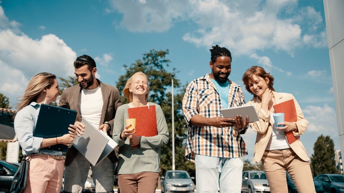 students in a line smiling