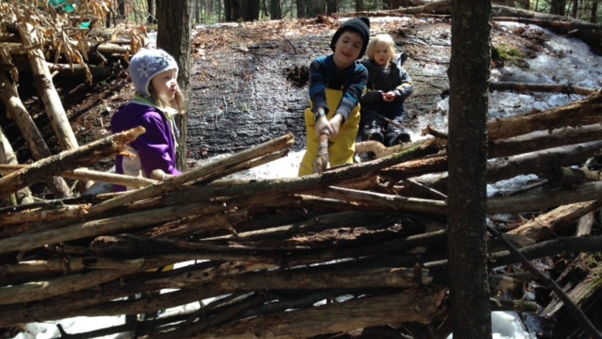 Ottauquechee School students building a house. 