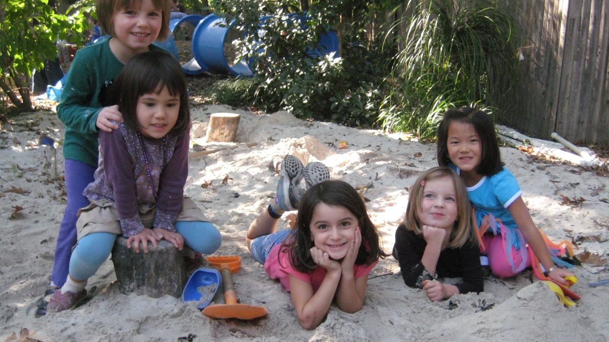 Children play outside every day, rain or shine.