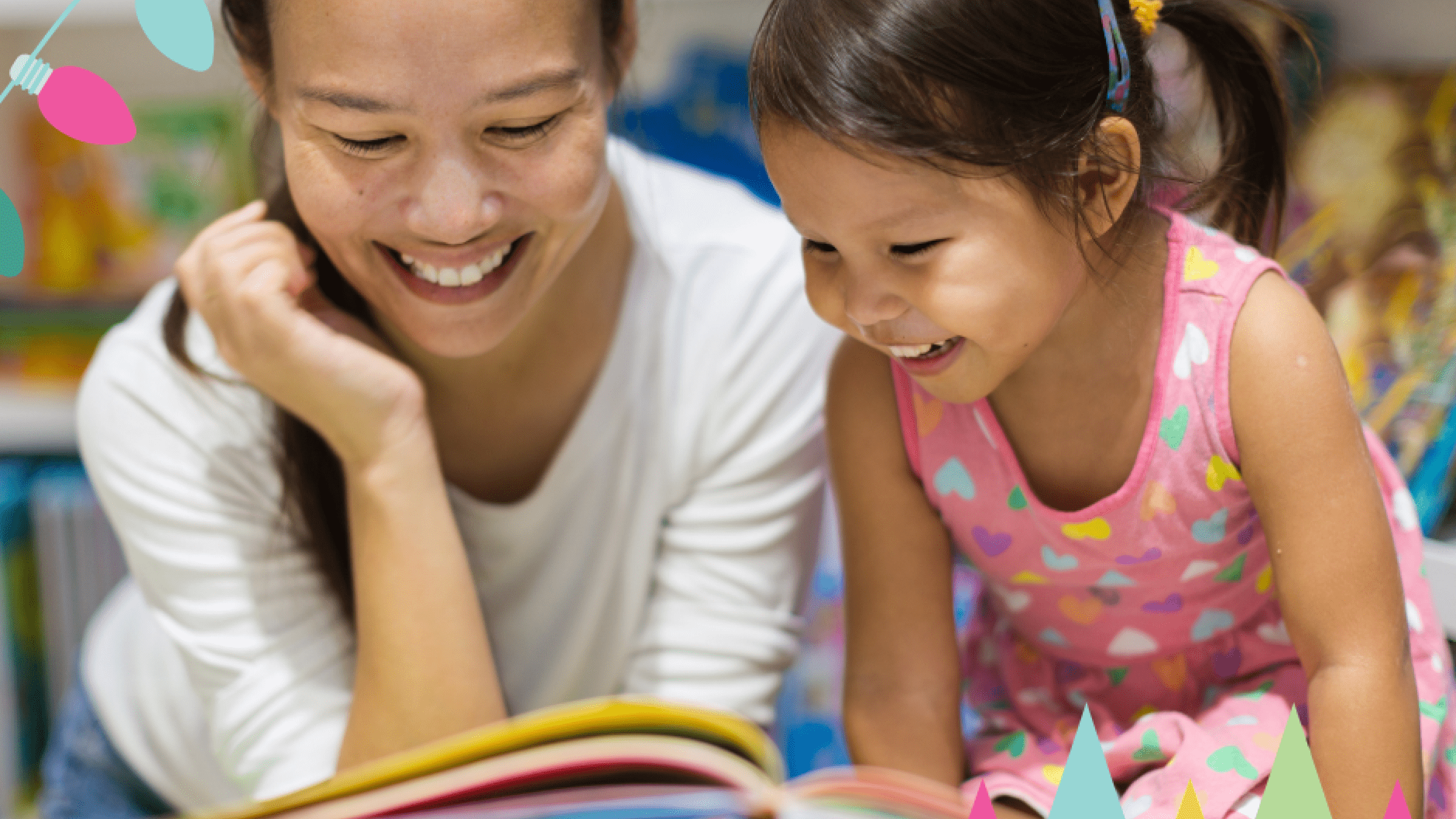 mother with child looking at book at book fair