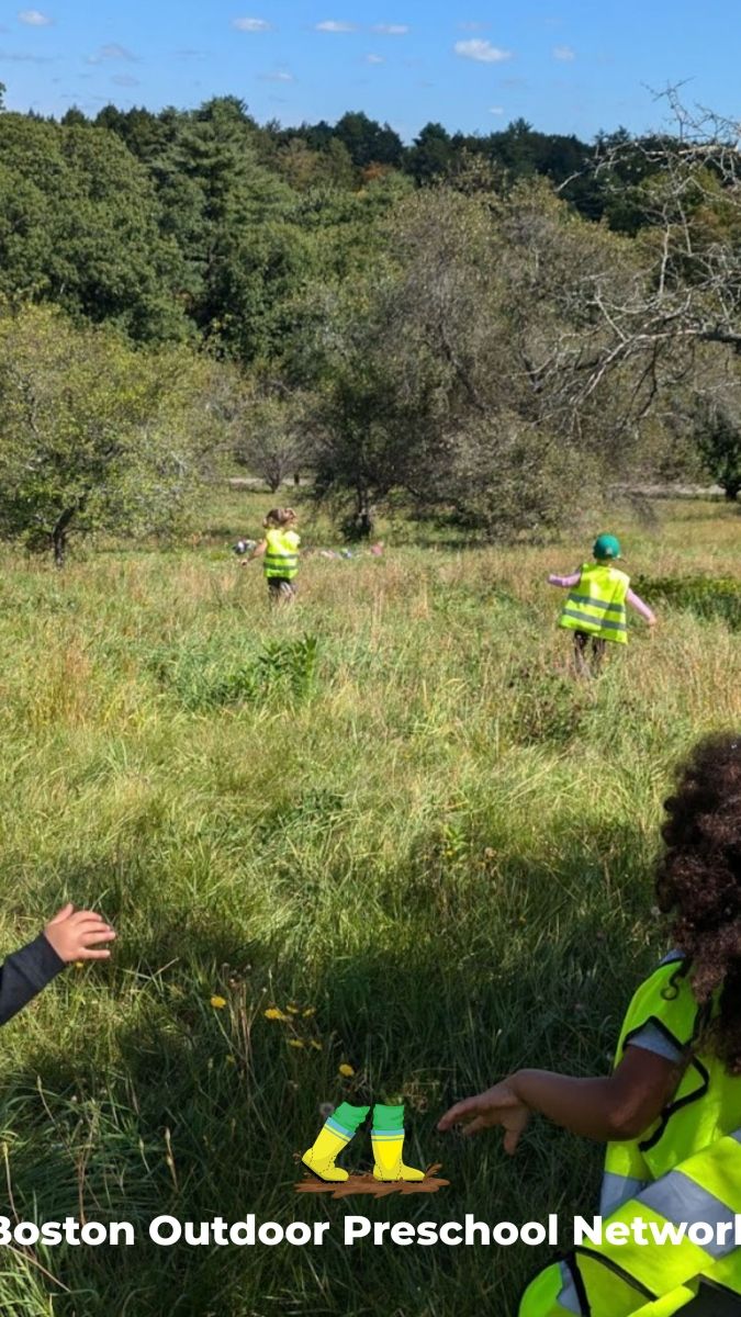 children frolicking in a field