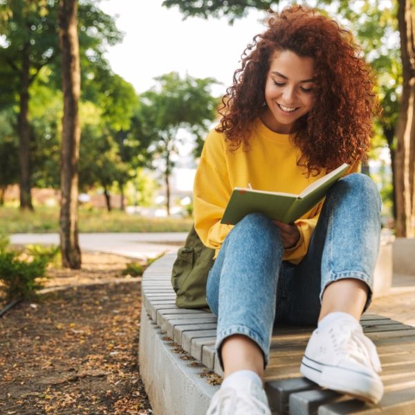student outside studying